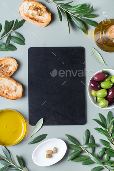 Extra virgin olive oil on a table / Photodune, Misc