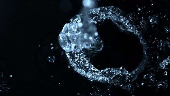 Super Slow Motion Shot of Splashing Water on Black Background at 1000Fps