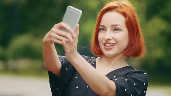 Beautiful Caucasian Redhead Girl Stylish Model Woman Female Blogger Takes Selfie Photo