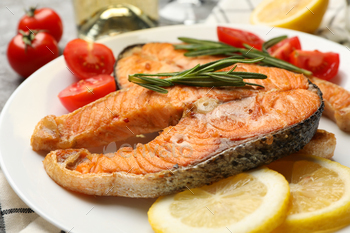 Composition with tasty grilled salmon, close up / Photodune, Misc