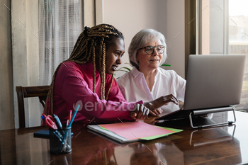 Multiracial senior and young business people with working inside modern office / Photodune, Misc