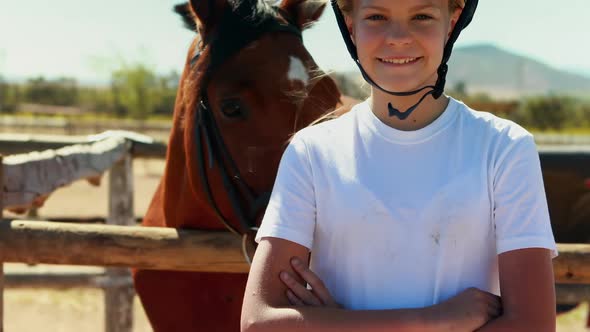 Portrait of girl standing with arms crossed in ranch 4k