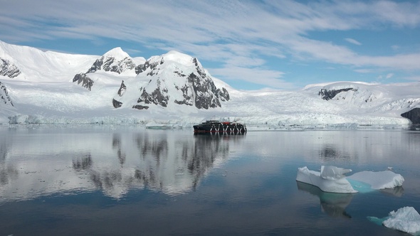 Global warming and climate change. Melting glaciers in the Arctica and Antarctica.