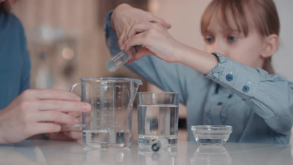 Little Girl Creating Homemade Sanitizer