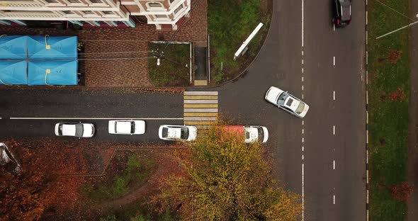 Top Down Drone Point of View - Steet City Road Intersection in Autumn Time