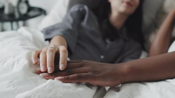 Hands of Loving Lesbian Couple