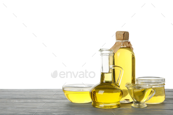 Composition with sunflower oil on wooden table isolated on white background / Photodune, Misc