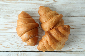 Croissants on white wooden background, top view / Photodune, Misc