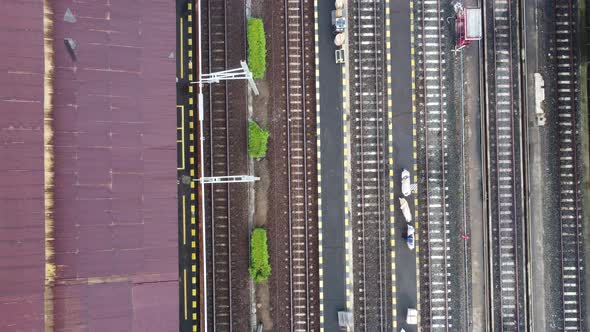 A drone flies over a train station. Aerial top view. Railway sorting station. Flying over railway tr