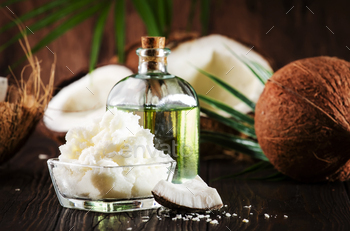 Coconut butter or oil. Organic healthy food, beauty and SPA product. Wooden background / Photodune, Misc