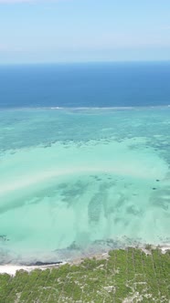 Tanzania  Vertical Video of the Ocean Near the Coast of Zanzibar Slow Motion