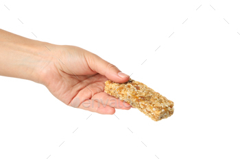 Female hand hold granola bar, isolated on white background / Photodune, Misc