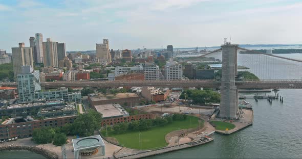 Aerial Overview Brooklyn Bridge with American Flag East River View Brooklyn New York City Skyline