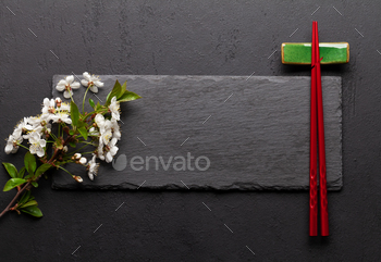 Japanese food with cherry blossom and sushi chopsticks / Photodune, Misc