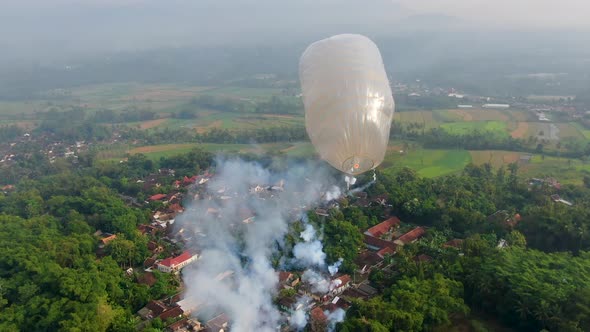 Traditional hot air balloon with fire crackers on Idul Fitri festival, Indonesia