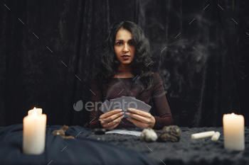 d art vintage astrology. Fortune teller woman reading future on magical tarot cards.