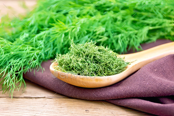 Dill dry in spoon on wooden board / Photodune, Misc