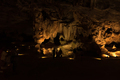 Silhouettes of people against rock formations in the Cango Caves - PhotoDune Item for Sale