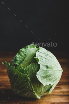 White Cabbage on Wooden Table / Photodune, Misc
