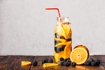 Bottle of Water with Orange and Blackberry. / Photodune, Misc