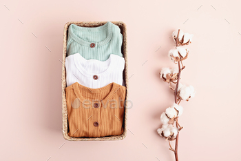 Gender neutral baby garment. Organic cotton clothes, newborn fashion / Photodune, Misc