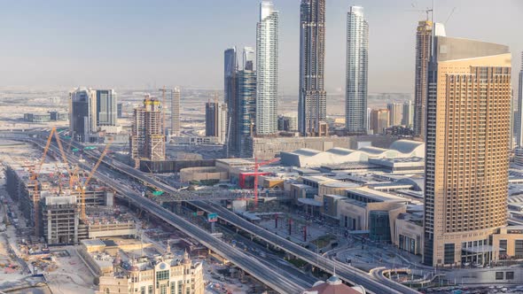 Dubai Downtown Skyline at Sunset Timelapse and Road Traffic Near Mall UAE