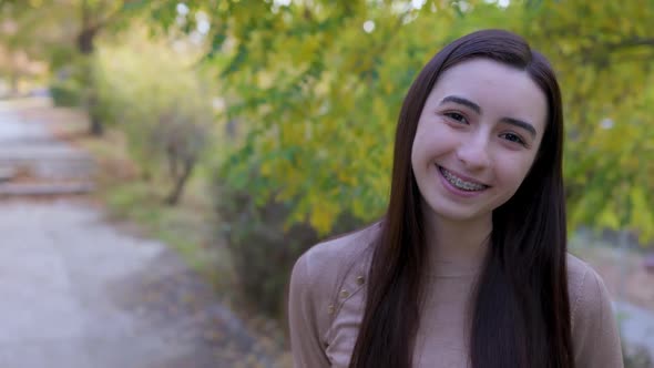 Smiling Teenager Girl with Braces