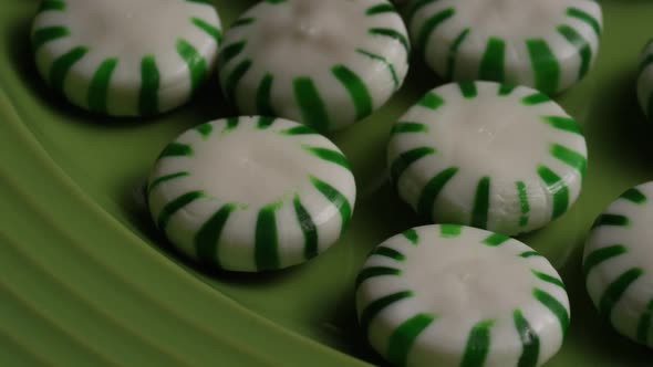 Rotating shot of spearmint hard candies - CANDY SPEARMINT 030