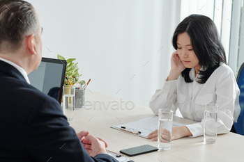 Serious businesswoman attending job interview / Photodune, Misc