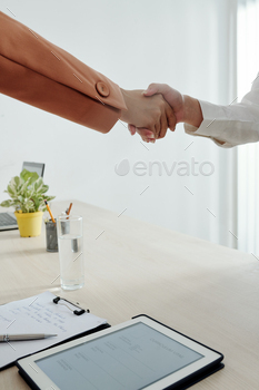 cant shaking hands after successful job interview