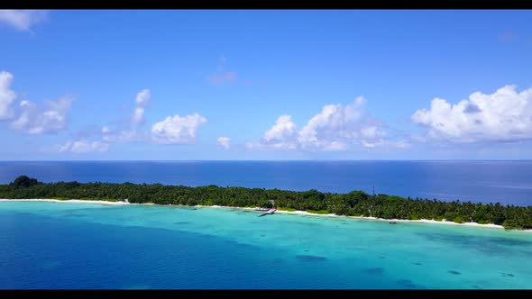 Aerial drone view sky of tropical bay beach adventure by transparent lagoon with bright sand backgro