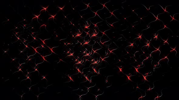 abstract forming dots of red flashing lights, black background