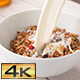 Pouring Milk into Bowl of Granola - VideoHive Item for Sale