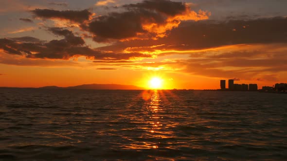 Sunset And Heavenly Clouds And Sea Time Lapse