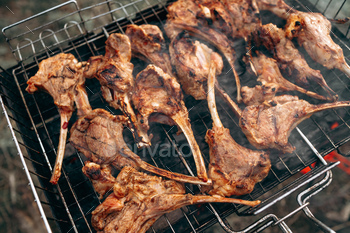 Grilling a rack of lamb on grill barbecue / Photodune, Misc