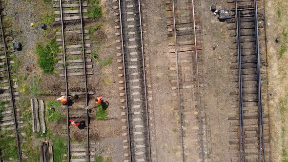 Workers Are Repairing A Damaged Railway