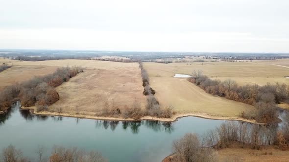 Flying over lake in empty fields, no people around just amazing deserted scenery.