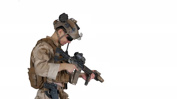 Soldier Changing Clip with Bullets on Automatic Rifle While Walking on White Background