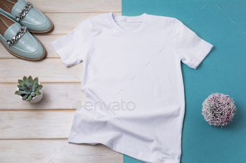 Placeit – Women white T-shirt mockup with turquoise loafers / Photodune, Misc