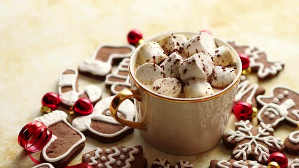 Cup of Hot Chocolate and Christmas Shaped Gingerbread Cookies