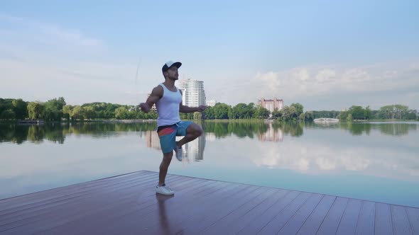 Handsome Muscular Young Man Exercising with Jump Rope