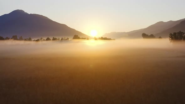 Drone Over Ethereal Misty Landscape Of Zell Am See In Morning