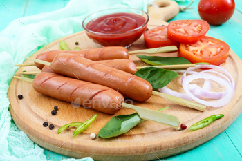 Juicy sausages on skewers with tomatoes and tomato sauce / Photodune, Misc