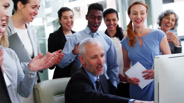 Group of Business people appreciating their colleagues works