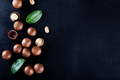 Australian peeled and whole macadamia nut with green leaves - PhotoDune Item for Sale