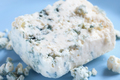 Dor blue cheese with mold on blue plate - PhotoDune Item for Sale