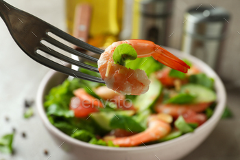 Concept of tasty eating with shrimp salad, close up / Photodune, Misc