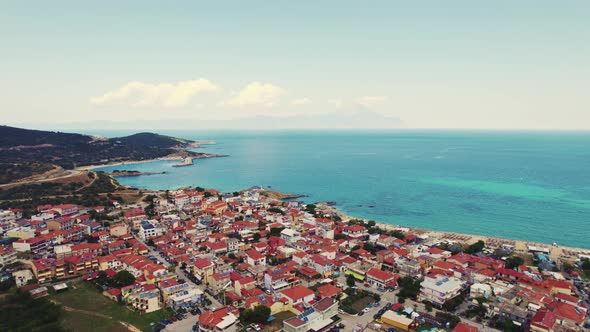 Dark Clouds Slowly Covering Greek Town with a Shadow