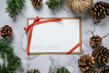 Mockup card with invitation card with Gift shop used to decorate Christmas on white background. / Photodune, Misc