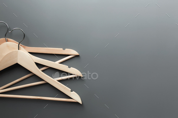 Black Friday or clothing industry concept on gray background with wooden hangers / Photodune, Misc